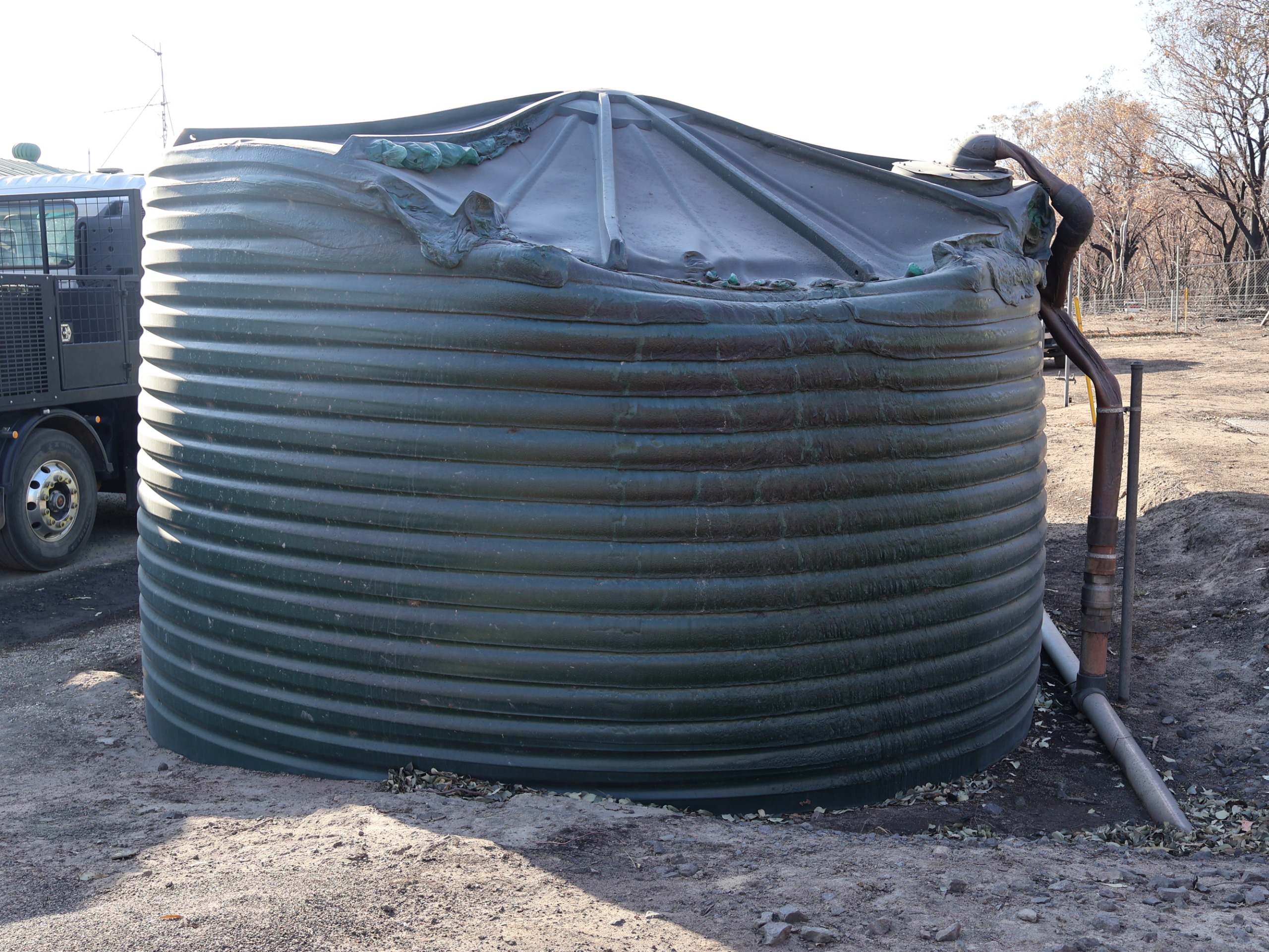 A water storage tank at the Longwood Water Treatment Plant melted from the heat of the bushfire event
